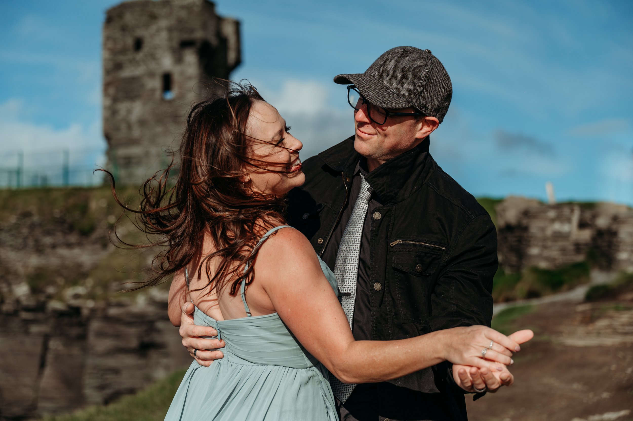 Marie O'Mahony photographer Cliffs of Moher anniversary couples photo session dancing with castle