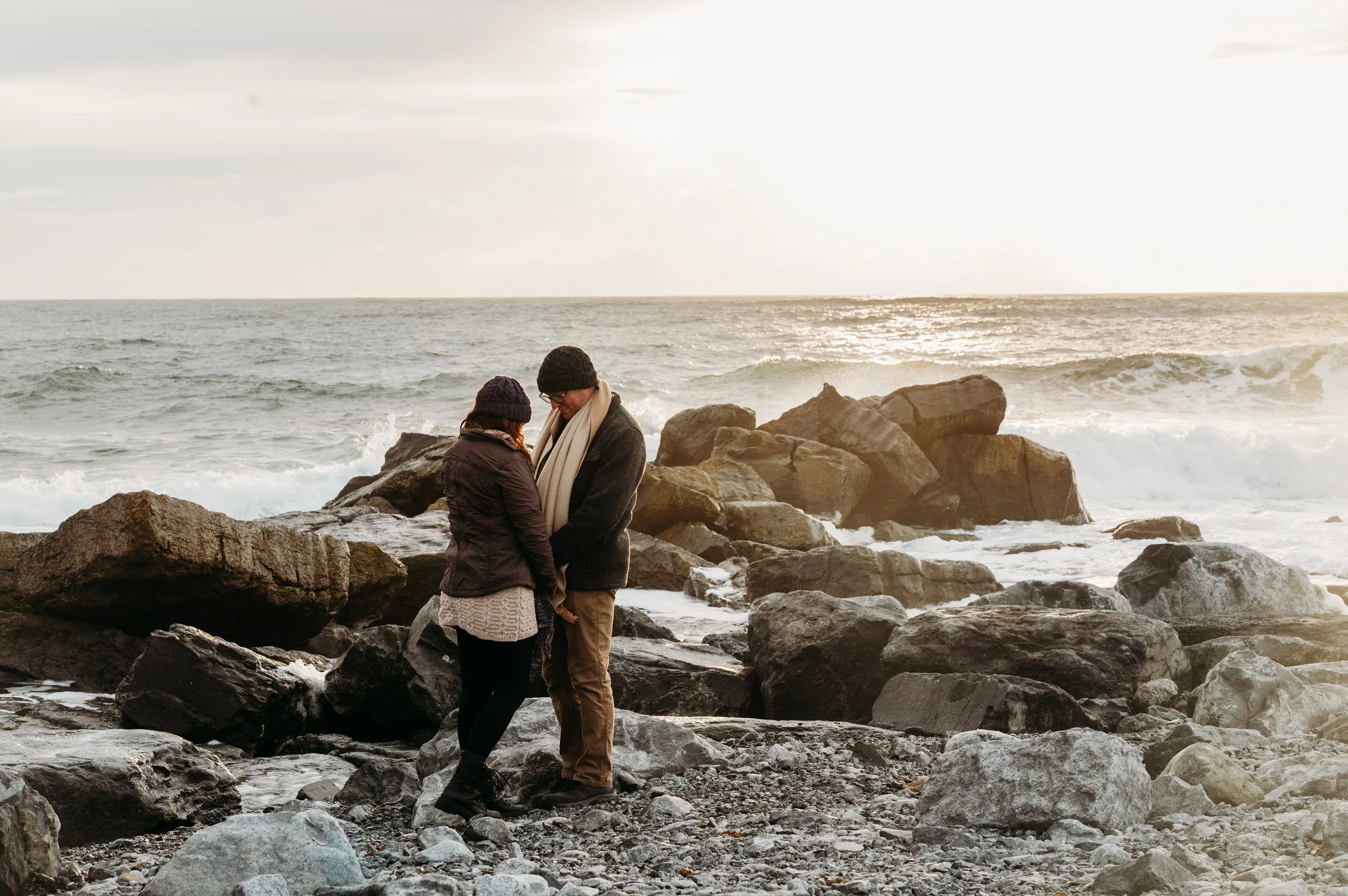 Marie O'Mahony photographer Doolin anniversary couples photo session standing in the sunset