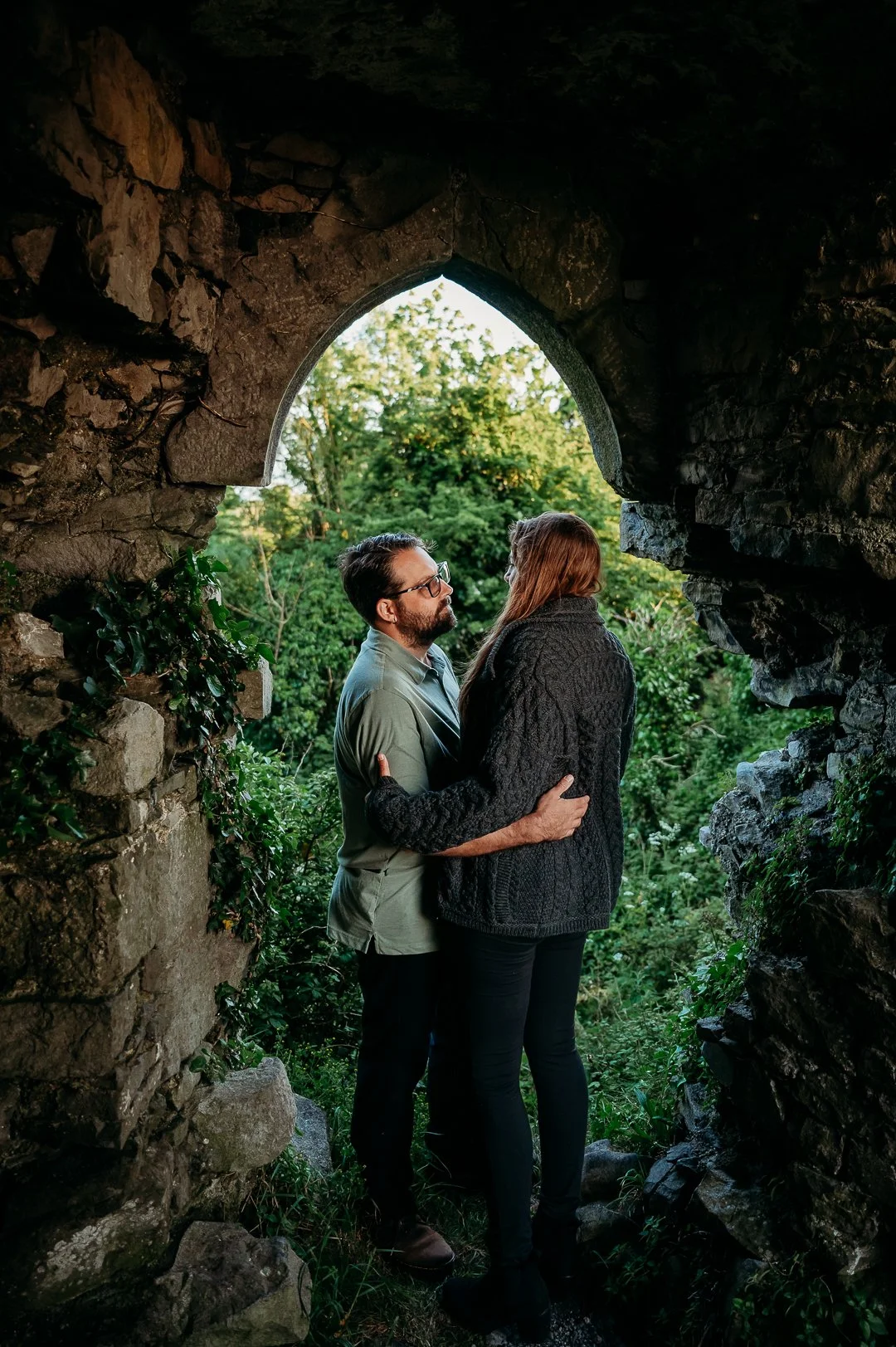Carrigogunnel castle photo session Ireland Marie O'Mahony photography couple in arched window