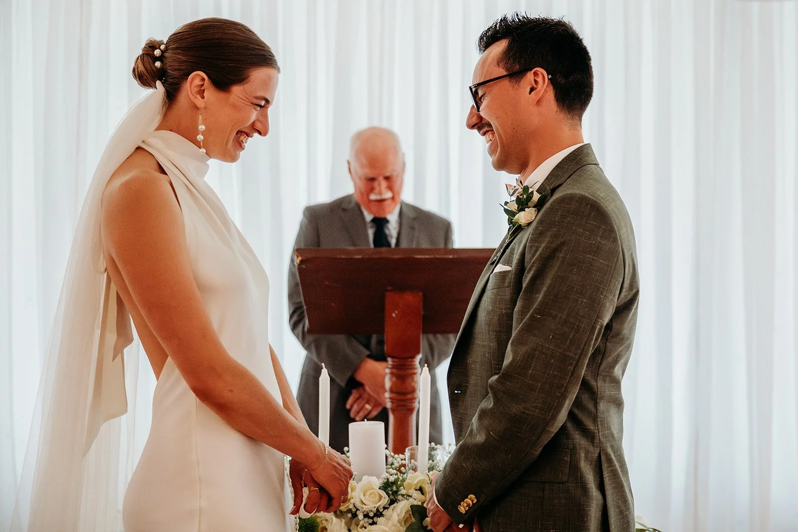 Galway Bay Hotel wedding photos couple saying vows inside ceremony