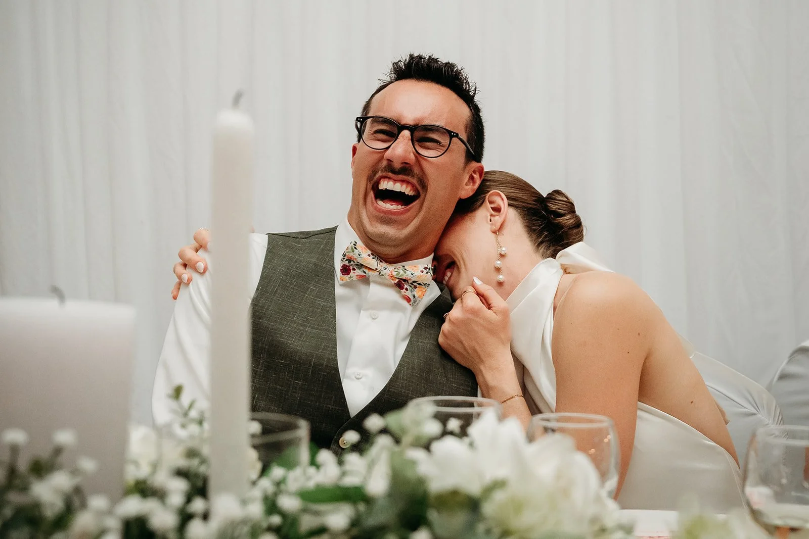 Galway Bay Hotel wedding photos bride and groom laughing during speeches