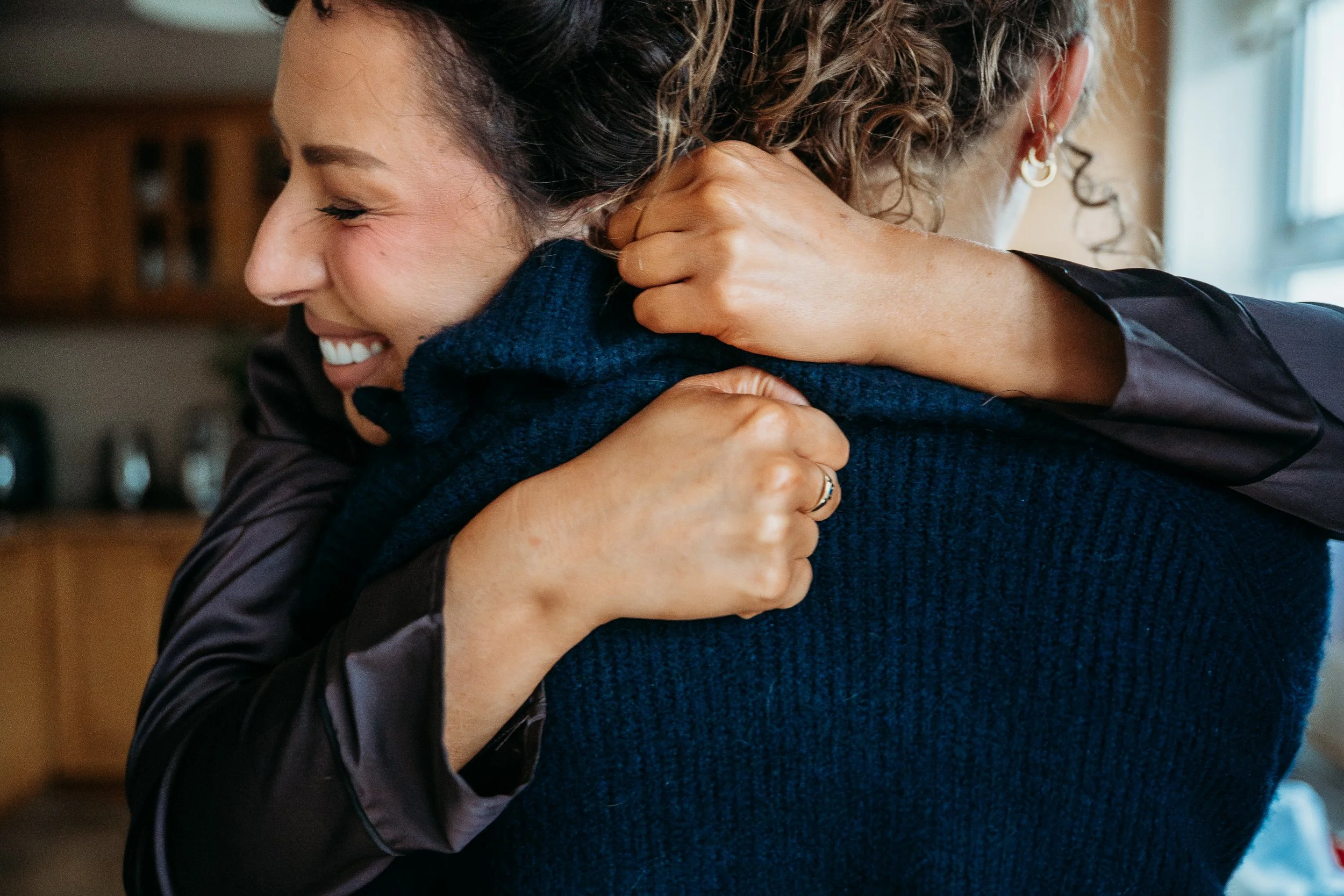 Limerick wedding photos getting ready bride hugging sister