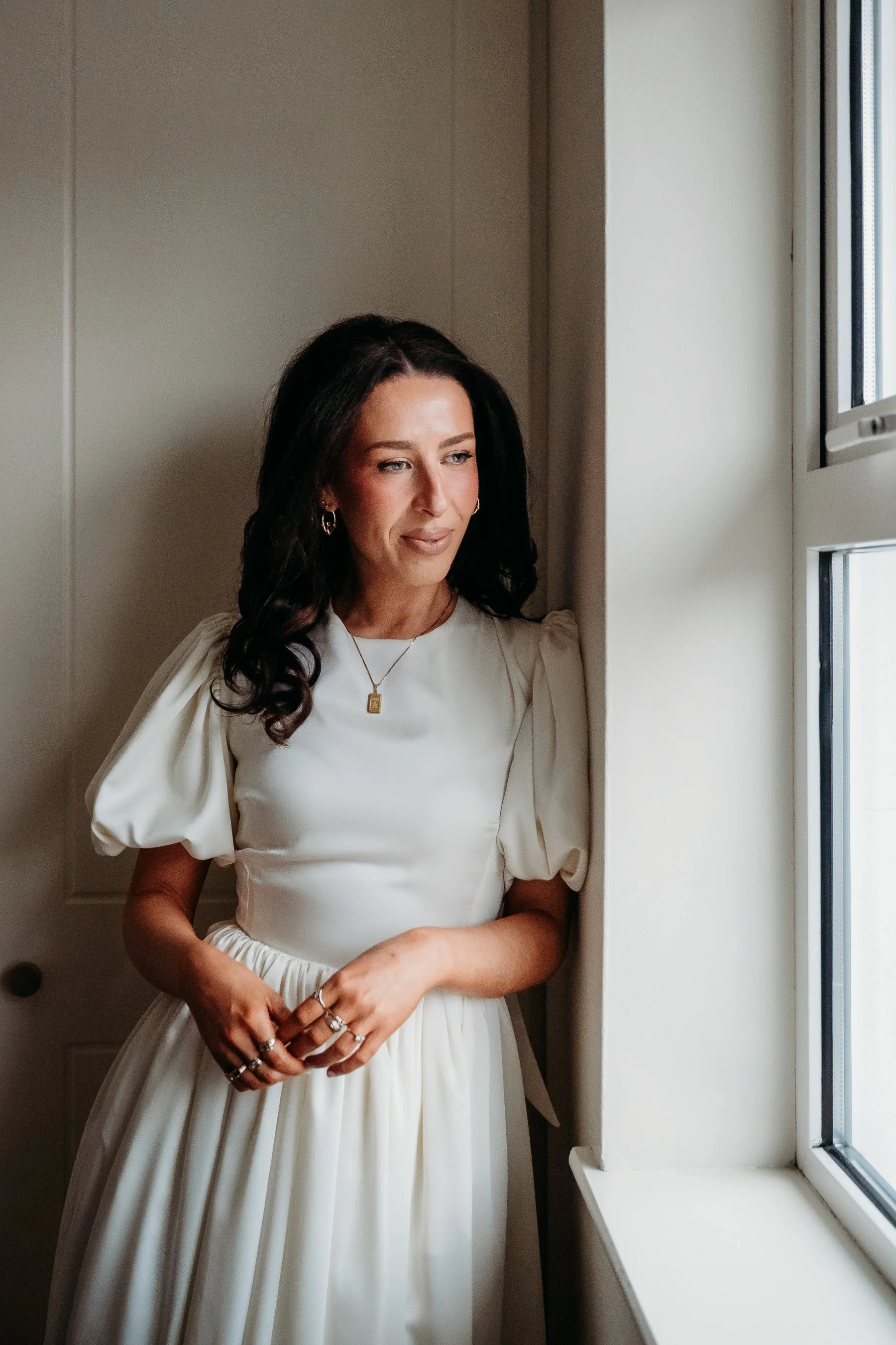 Limerick wedding photos getting ready bride portrait looking out window natural candid