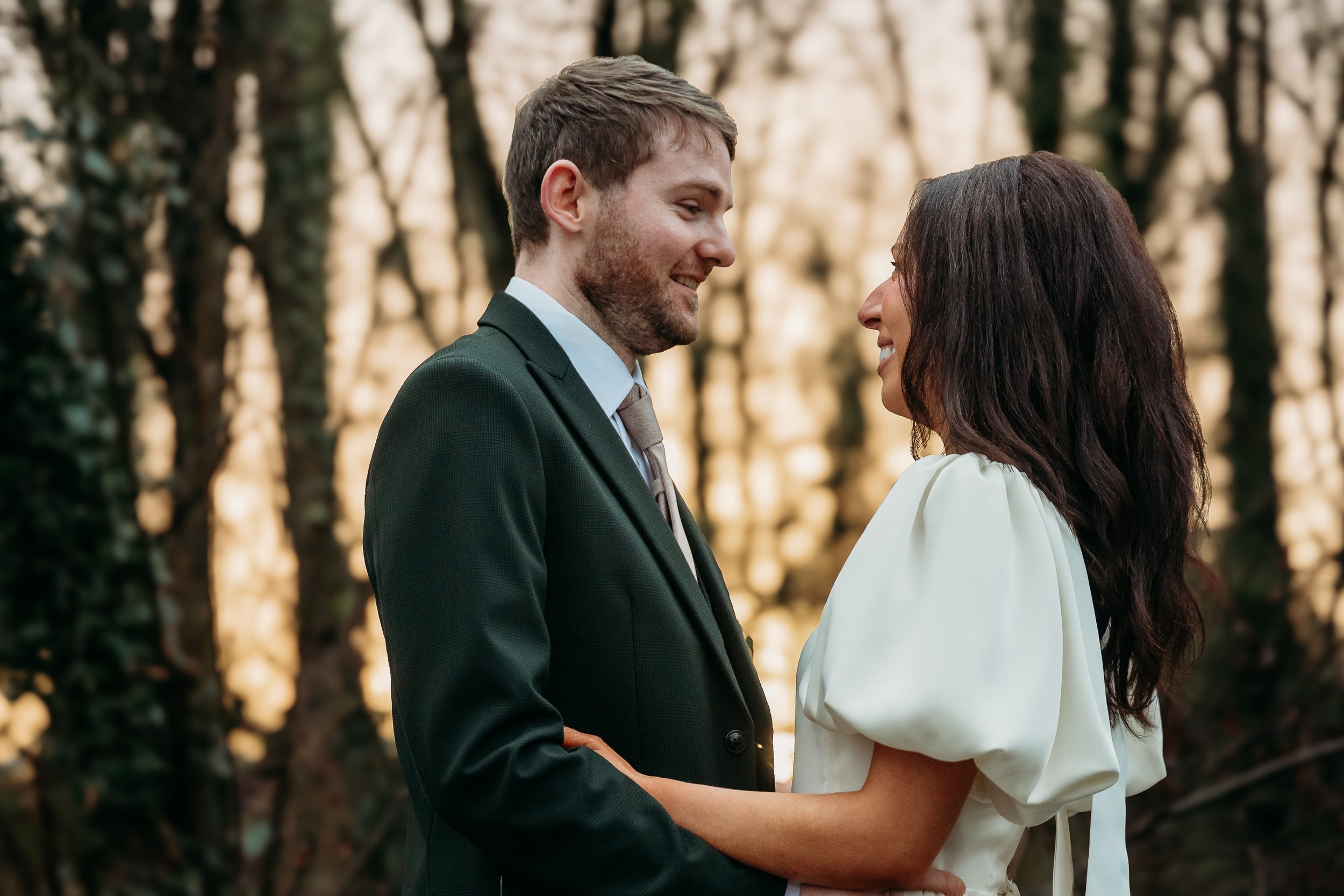 Limerick wedding photos couple's photo looking at each other woods in the background setting sun