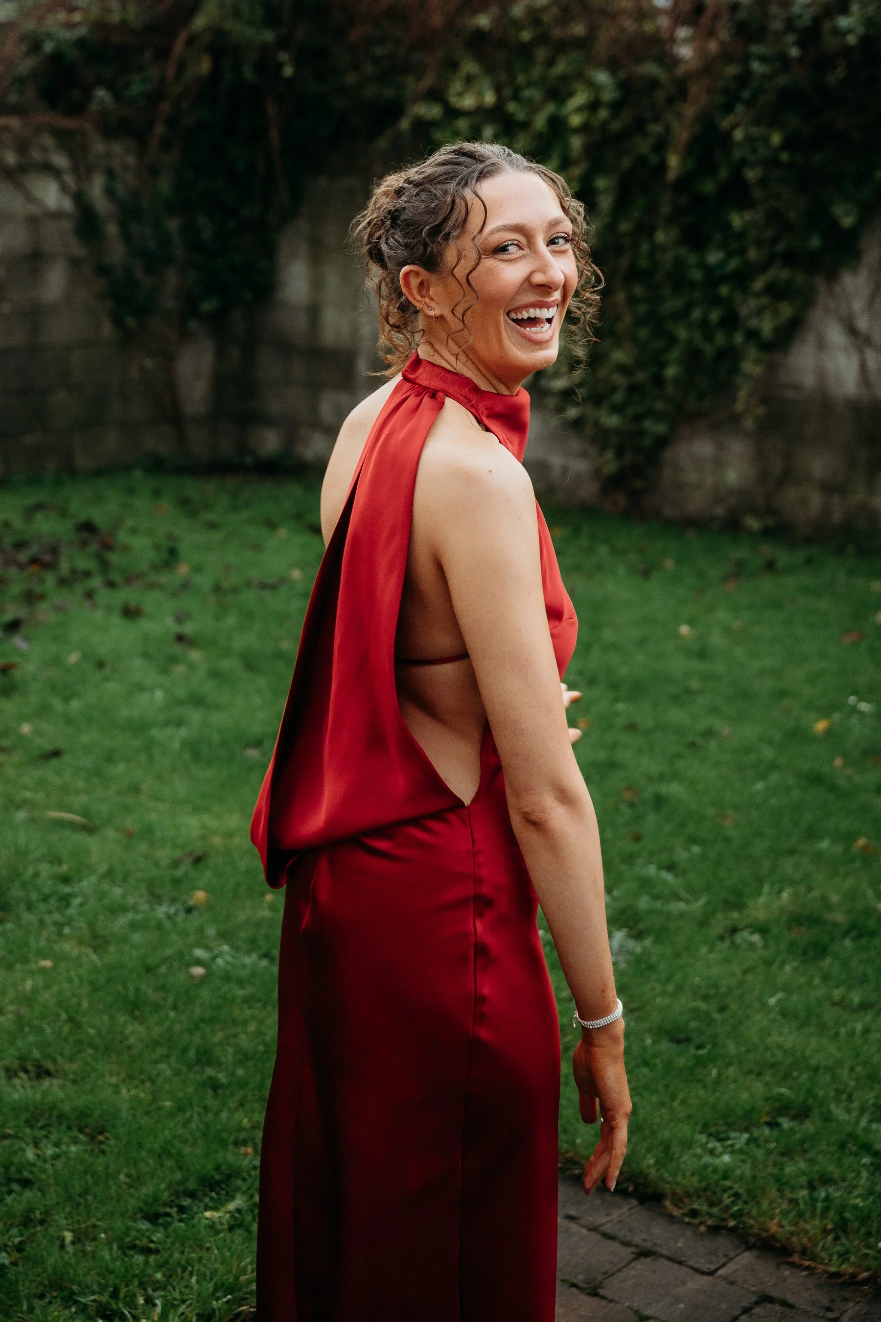 Limerick wedding photos bridesmaid in red dress back garden