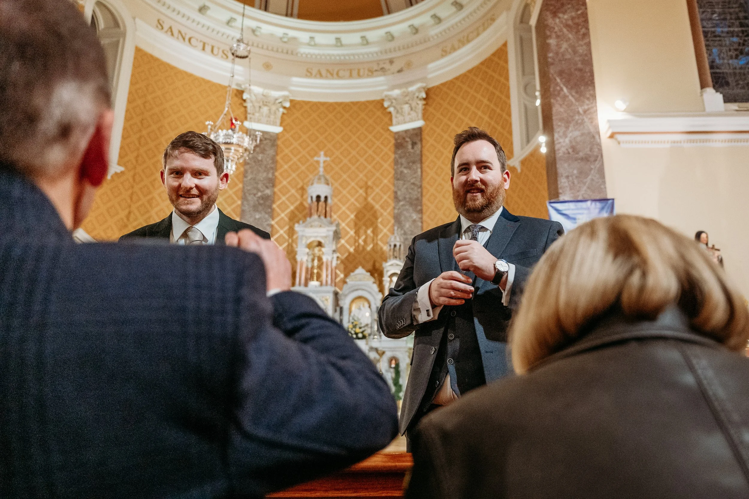 Wedding photo St Joseph's church Limerick city groom and best man standing