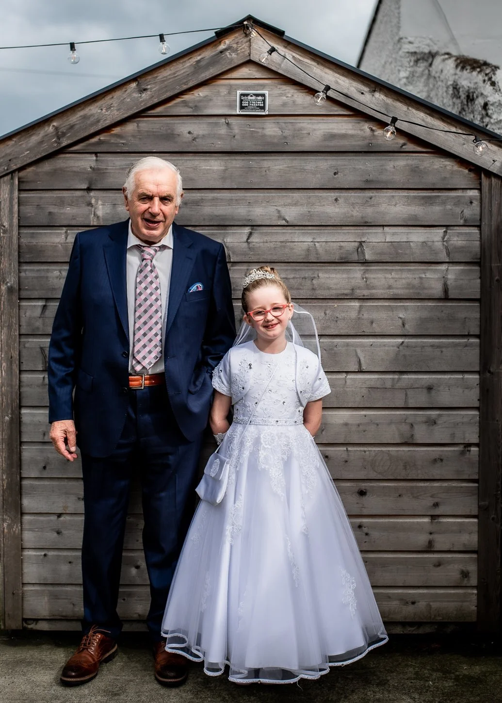 communion girl with grandpa.jpg