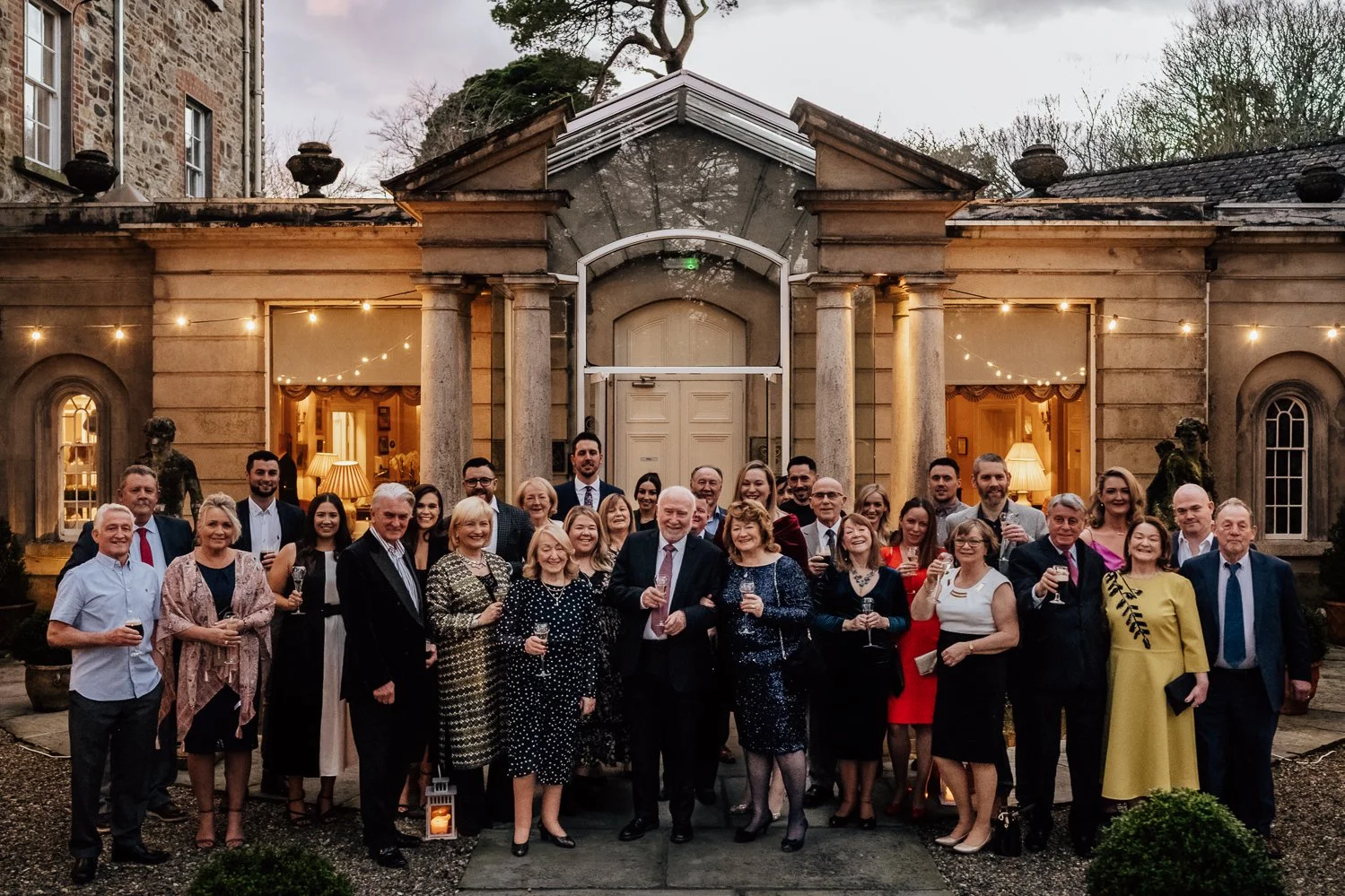 group photo outside dolores 70th.jpg