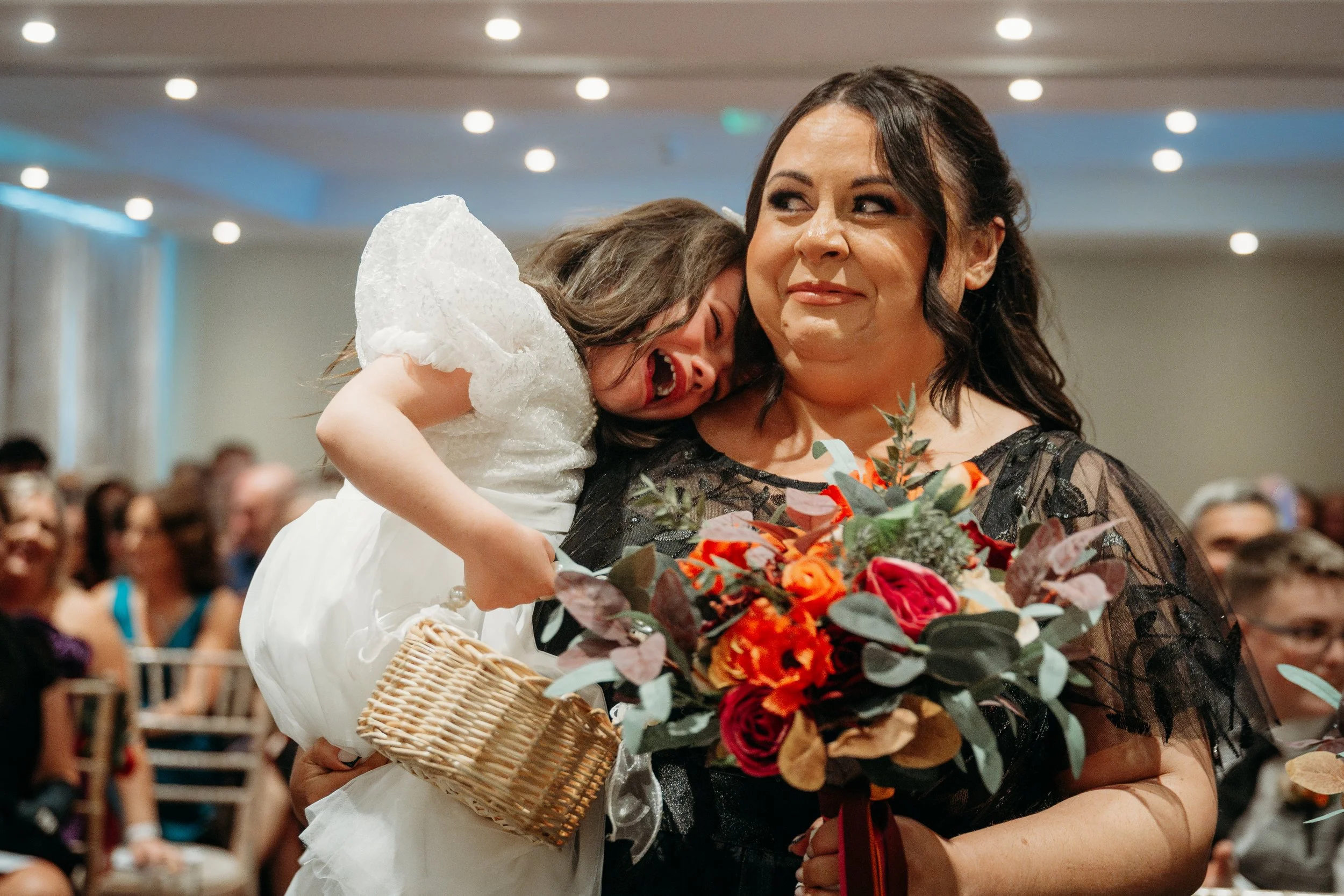 flower girl crying being carried Hotel Woodstock wedding photos Ennis