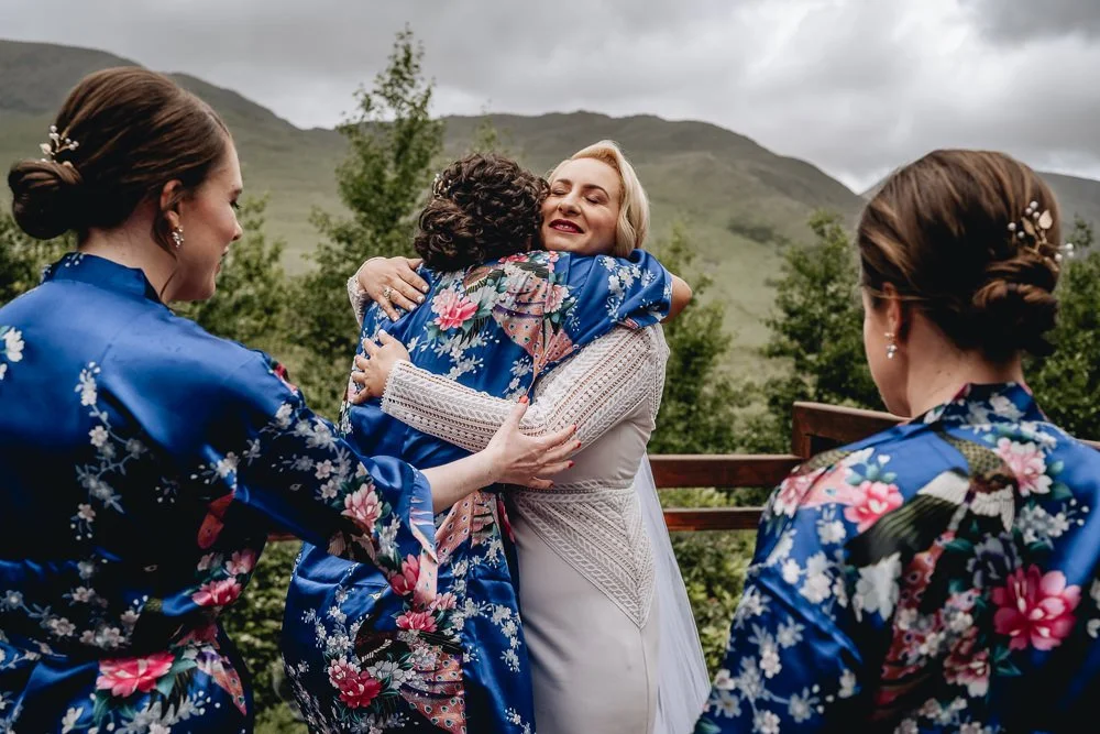 bride hugging bridesmaids in a Connemara Limerick wedding photographer