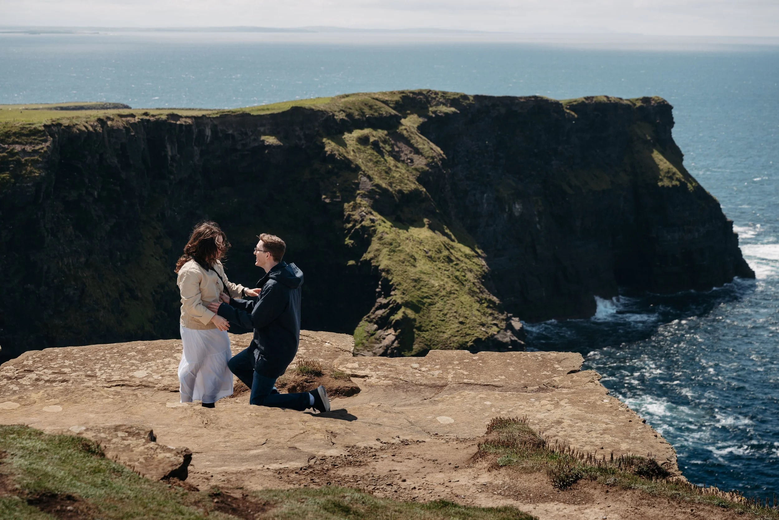 surprise proposal Cliffs of Moher Hags Liscannor proposal photographer Ireland Co Clare