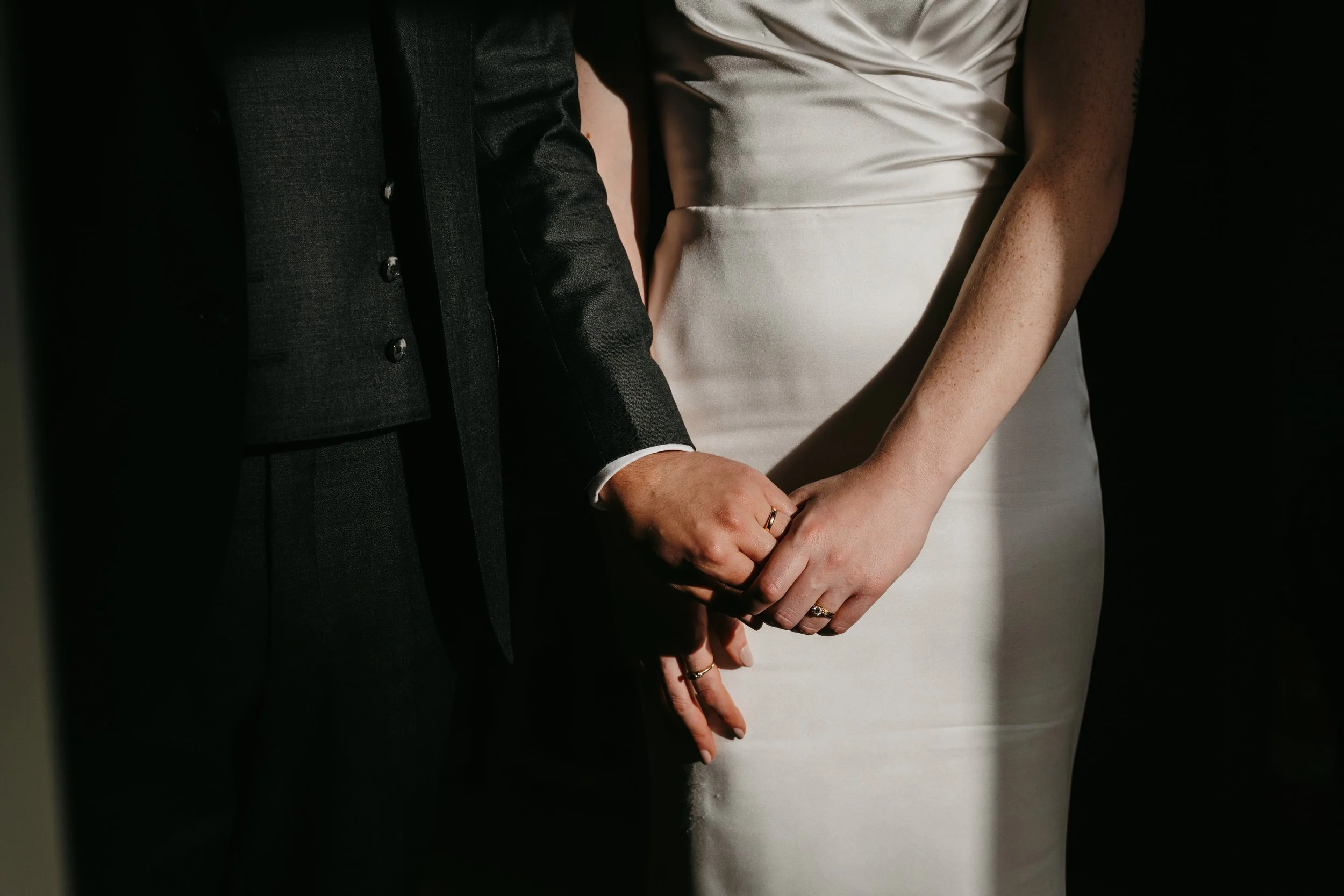 bride and groom holding hands ring shot natural wedding photos Fiddle and Bow Wedding Doolin photographer