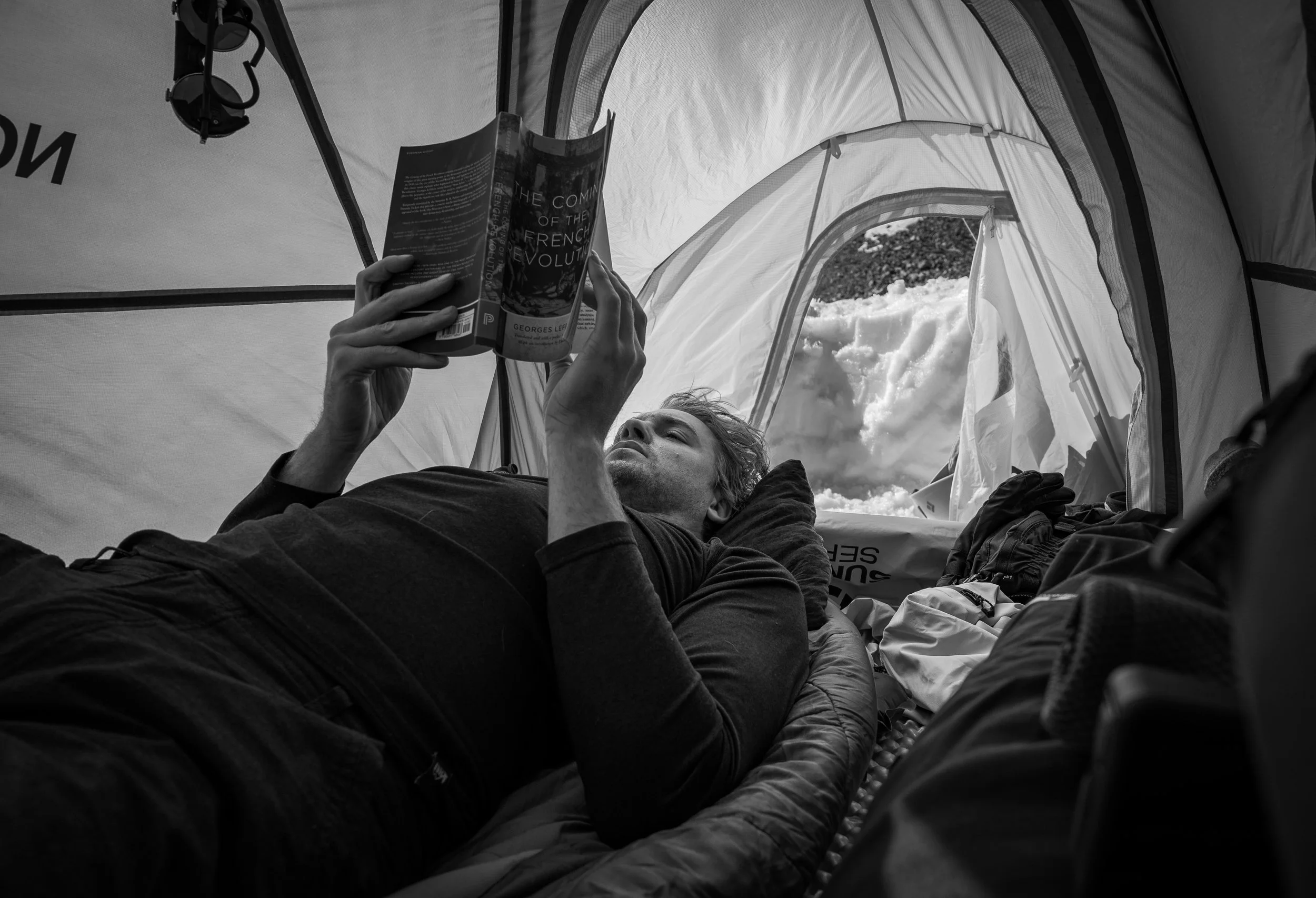 Ty doing some light reading on Mt. Shasta