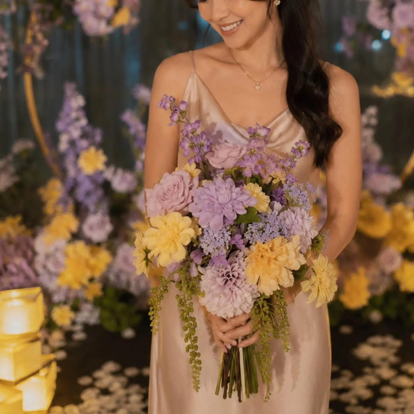 Rapunzel-inspired floral concept created for the modern fairytale proposal ✨💜🌼

Featuring a whimsical floral backdrop paired with a matching hand bouquet in soft lavender, lilac and golden tones.

Customised backdrop + matching bouquet designed to 