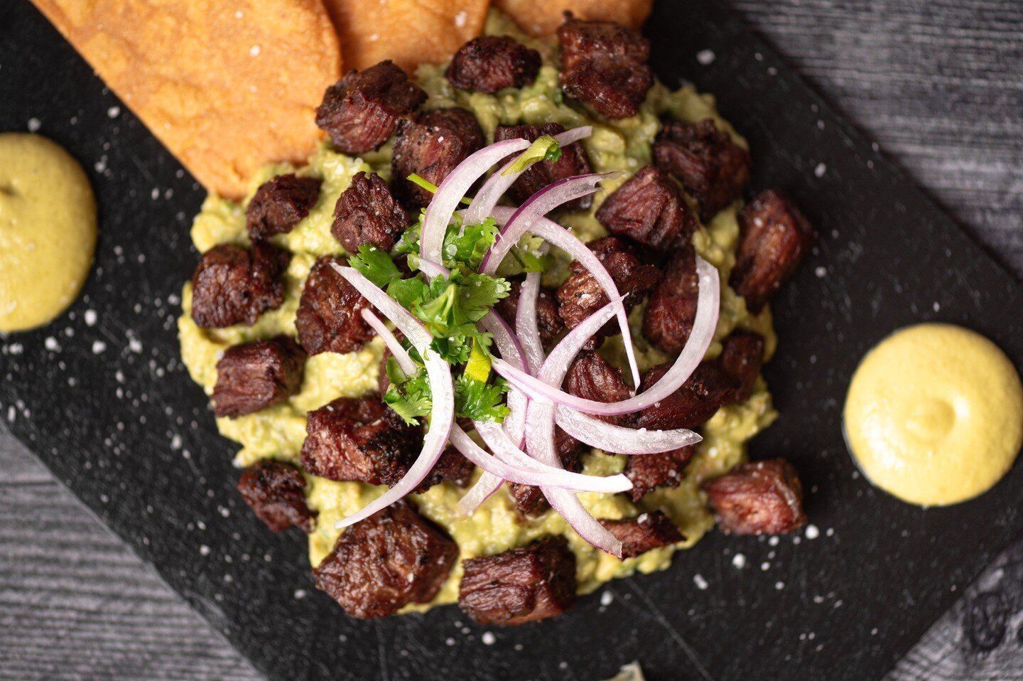 Our delicious Chicharr&oacute;n de Arrachera is perfect for sharing but it's so good, that we don't judge if you want it all for yourself. #🥩⁠
⁠
⁠
⁠
⁠
⁠
⁠
⁠
⁠
⁠
⁠
⁠
#cuishe #cuishecocinamexicana #guacamole #guac #avocado #beef #wagyubeef #heartbrand