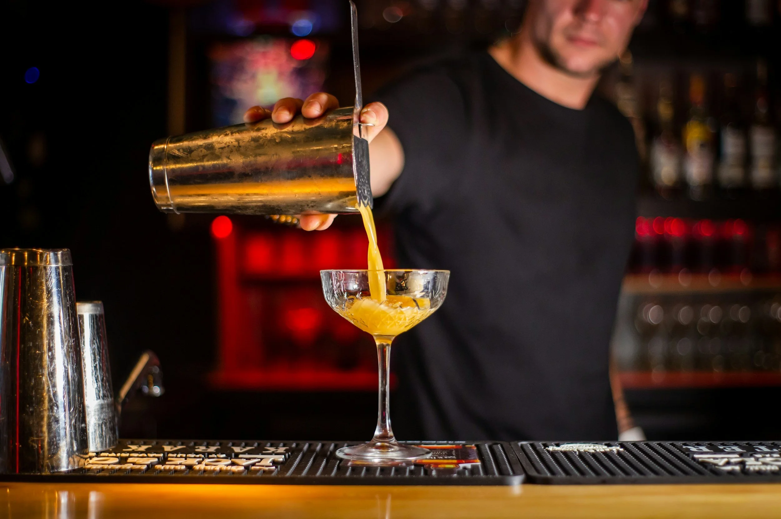 Craft cocktail on the bar at a cocktail bar in downtown New Haven