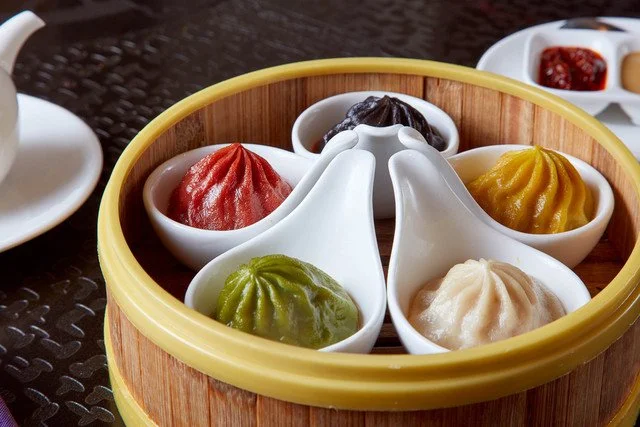 Assorted dim sum dishes on a table at Dragon Beaux in San Francisco