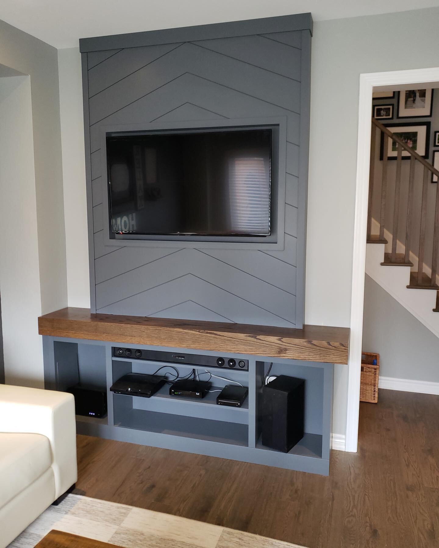 Remember that sneak peak from our story last week? Here&rsquo;s the final product! 😍 #custom shelving and tv cut out to fit our customers pre-existing electronics, complete with an oak mantel. We really love this one!!
.
.
Email us with your ideas t