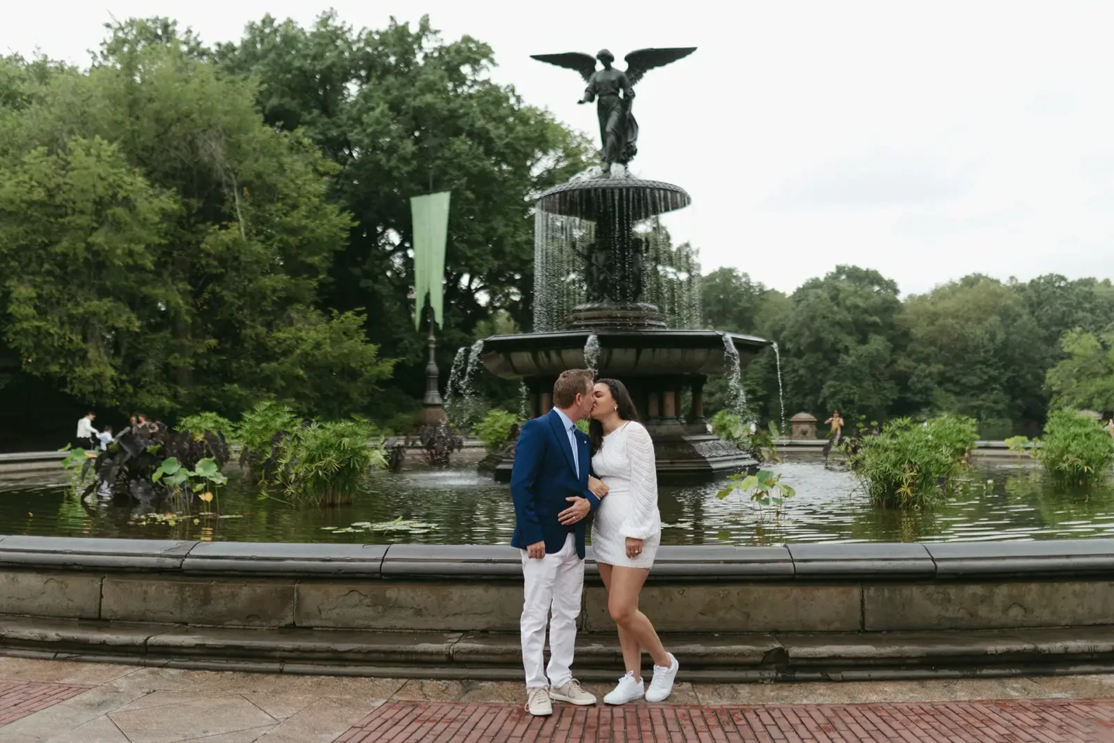 Couple eloping at Bethesda Terrace Central Park New York City — I Do Drive Thru NYC officiant from $500