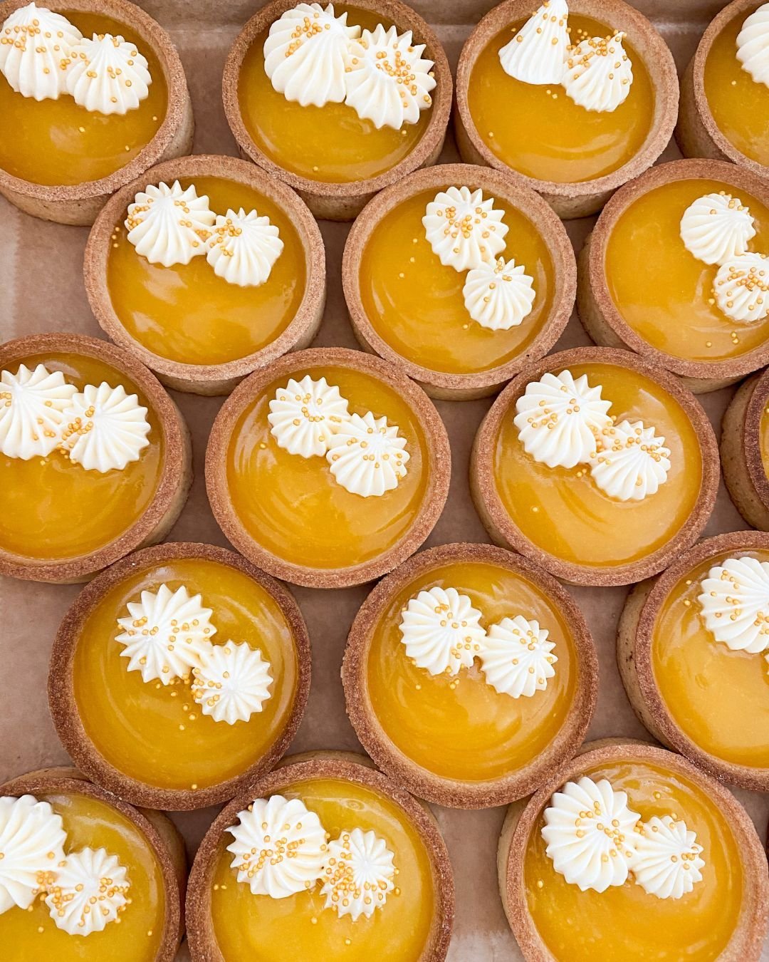 Bright, tangy, and impossible to ignore, these passionfruit tarts are basically sunshine in dessert form. I think right about this point, we can use a little sunshine on our minds?

 Warning: one tart is never enough, and sharing is definetly optiona