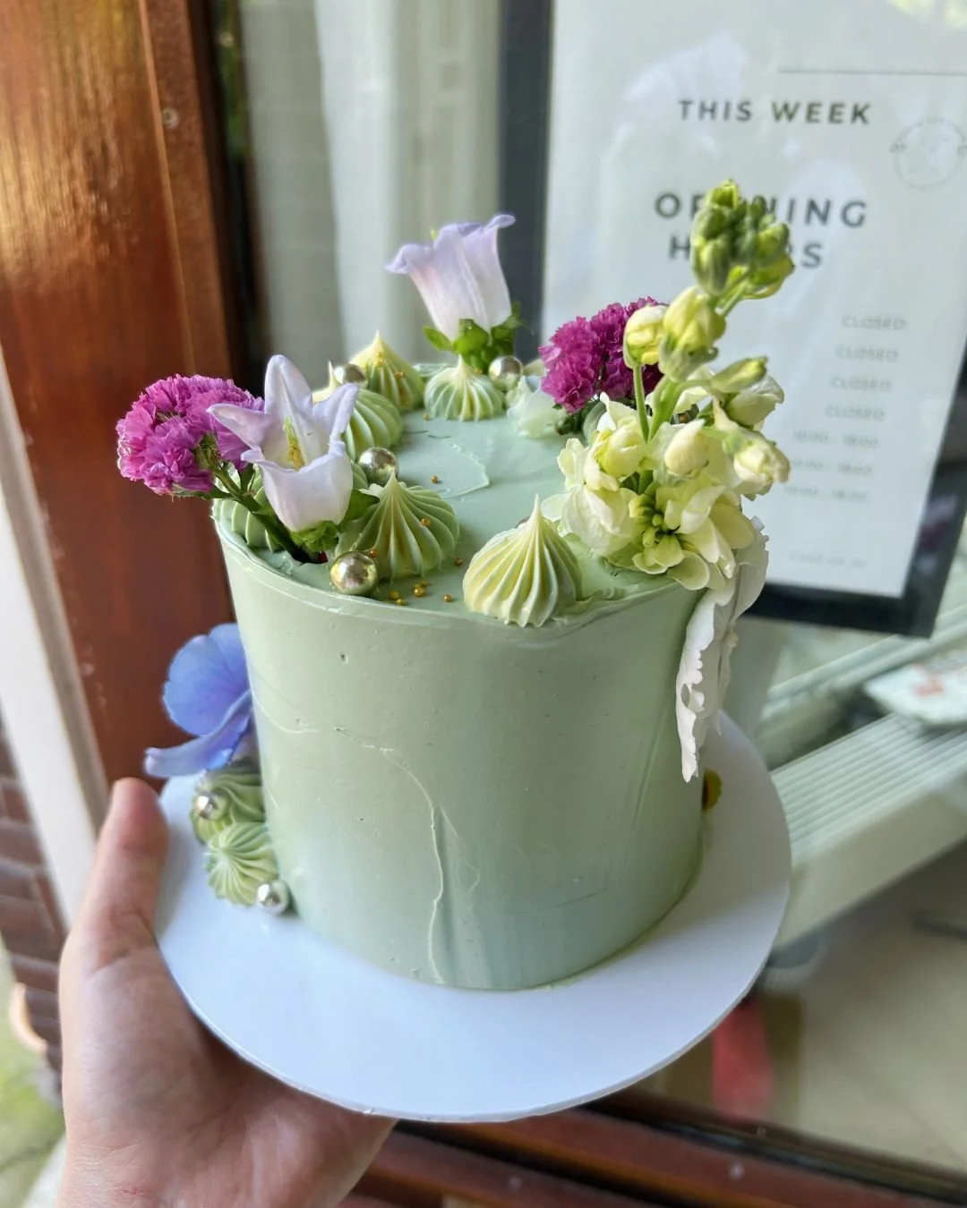 Spring called, and we answered. This sage green beauty dressed in blooms is everything we love about this season.