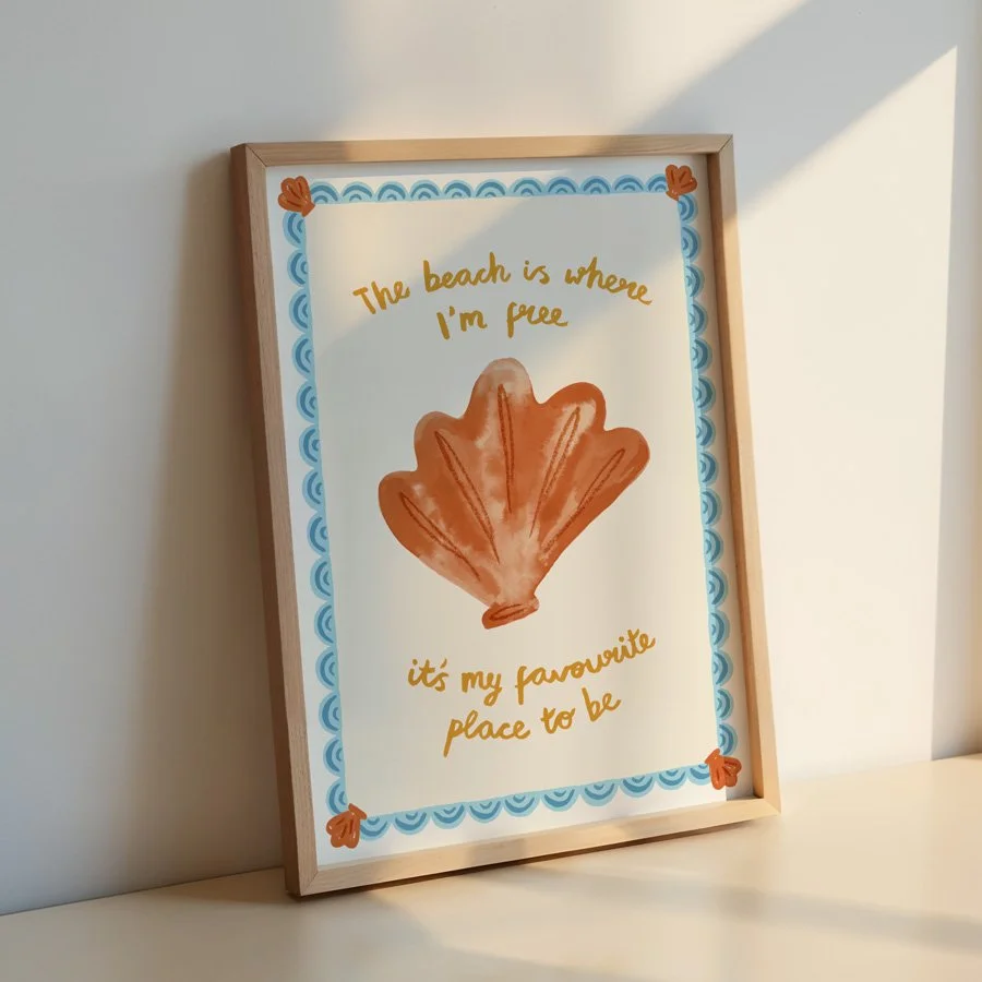 Under the Sea Nursery beach print in wooden frame leaning against wall