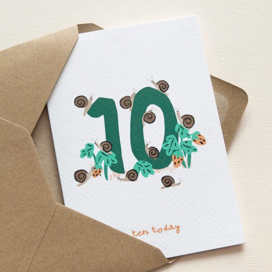 Snails 10th Birthday Card in kraft envelope on angle