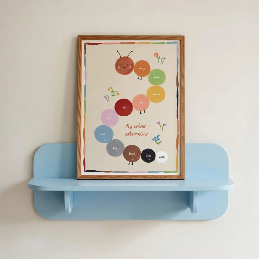 Colours Nursery Print styled on blue retro shelf in wooden frame