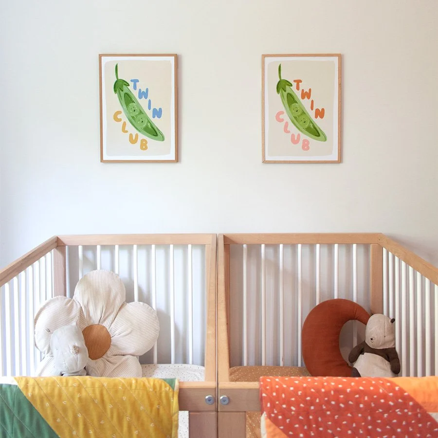 Peas in a Pod Twin Nursery Print Set styled above twin cots