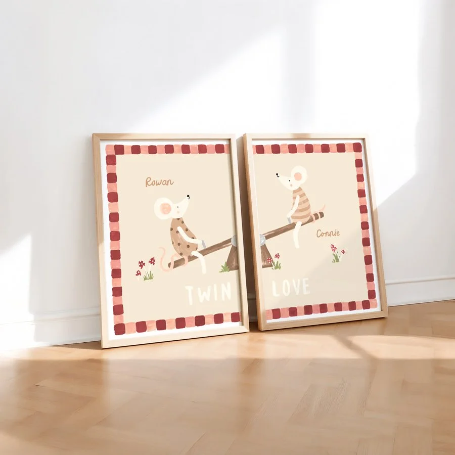 Personalised Twin Print Set in pink and burgundy in wooden frames against wall
