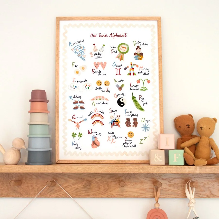 Twin Alphabet Print styled on shelf in twin nursery with pastel toys