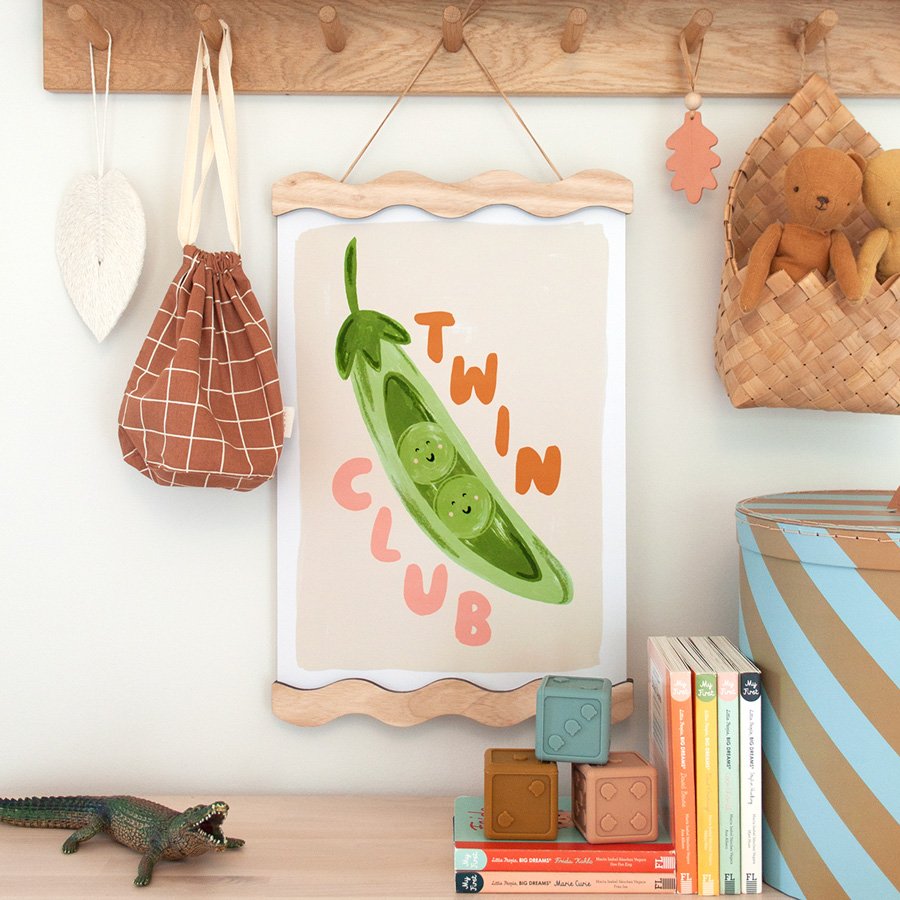 Peas in a Pod Twin Nursery Print styled on peg shelf