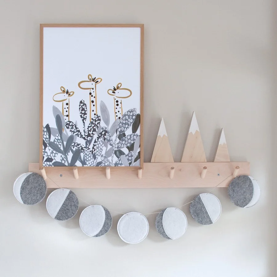 Giraffe Nursery Print styled with scandi style accessories