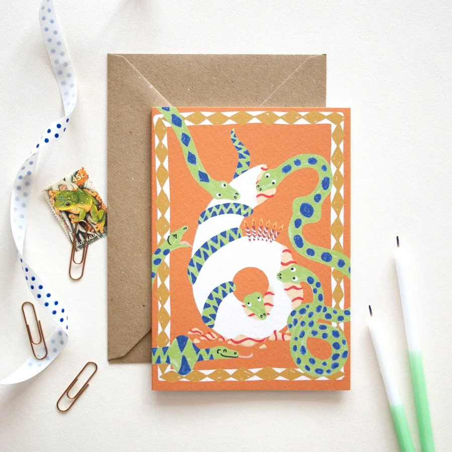 Snakes 6th Birthday Card styled with birthday candles and ribbon