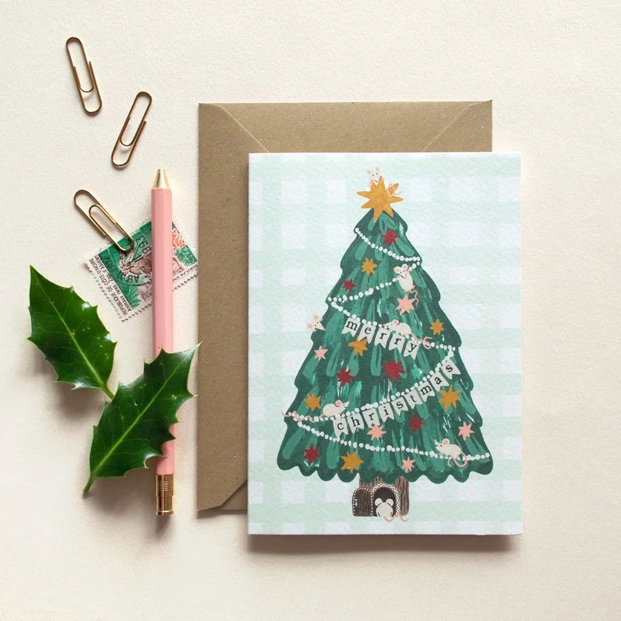 Mice Christmas Card styled with holly, a stamp, pen and paperclips