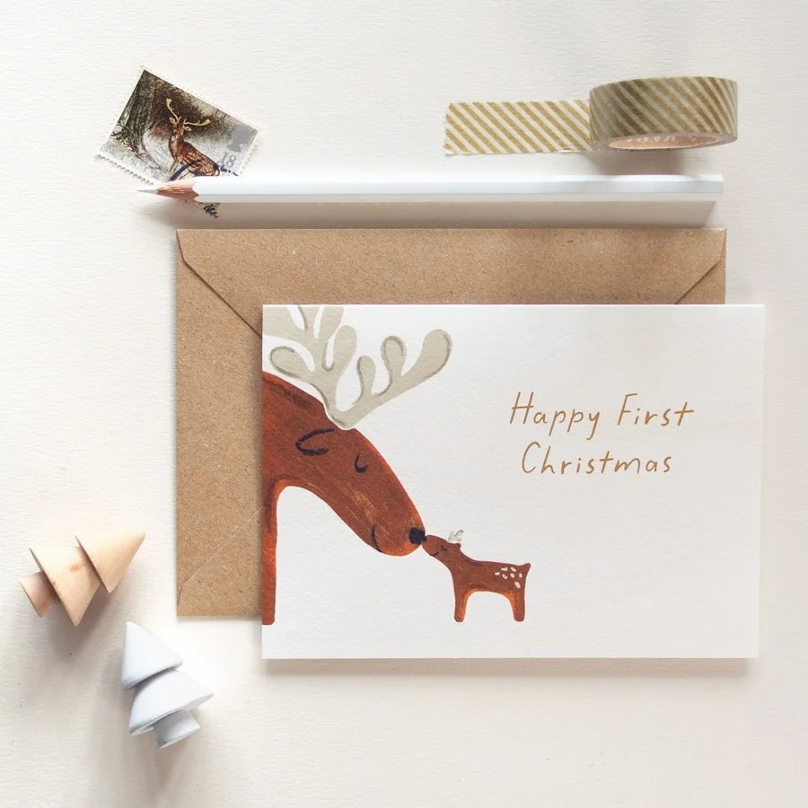Reindeer First Christmas Card styled with pencil, mini trees and stamp