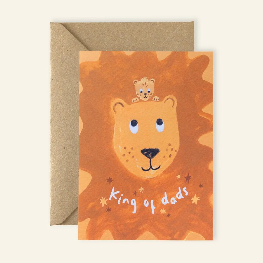 Lion Father's Day Card with kraft envelope on plain background