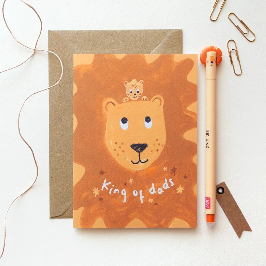 Lion Father's Day Card styled with lion pen, paperclips and string
