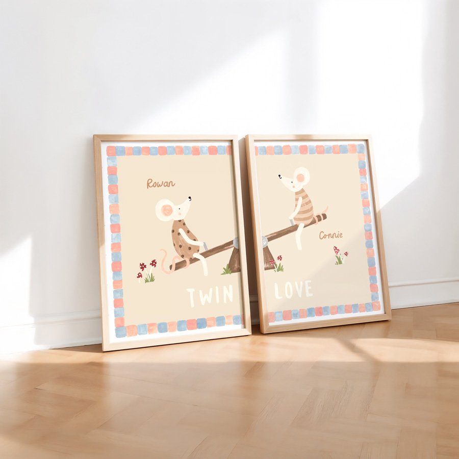 Personalised Twin Print Set pink and blue in wooden frames against wall