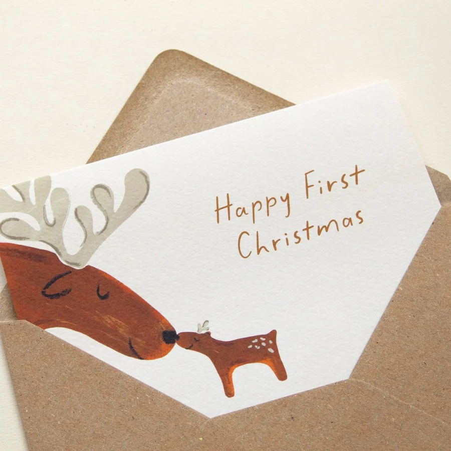 Reindeer First Christmas Card with kraft envelope angle