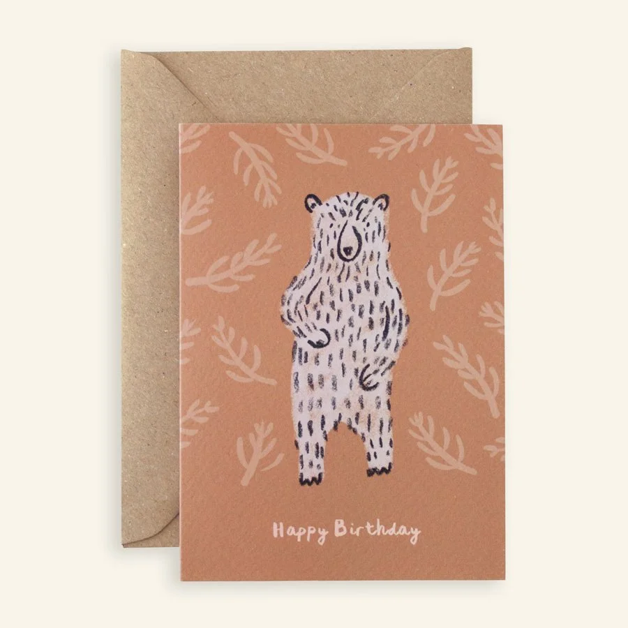 Terracotta bear birthday card on plain background