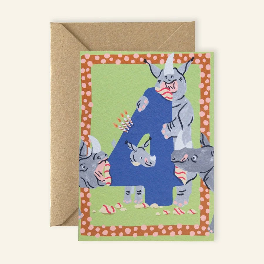 Rhinos 4th Birthday Card with kraft envelope on plain background