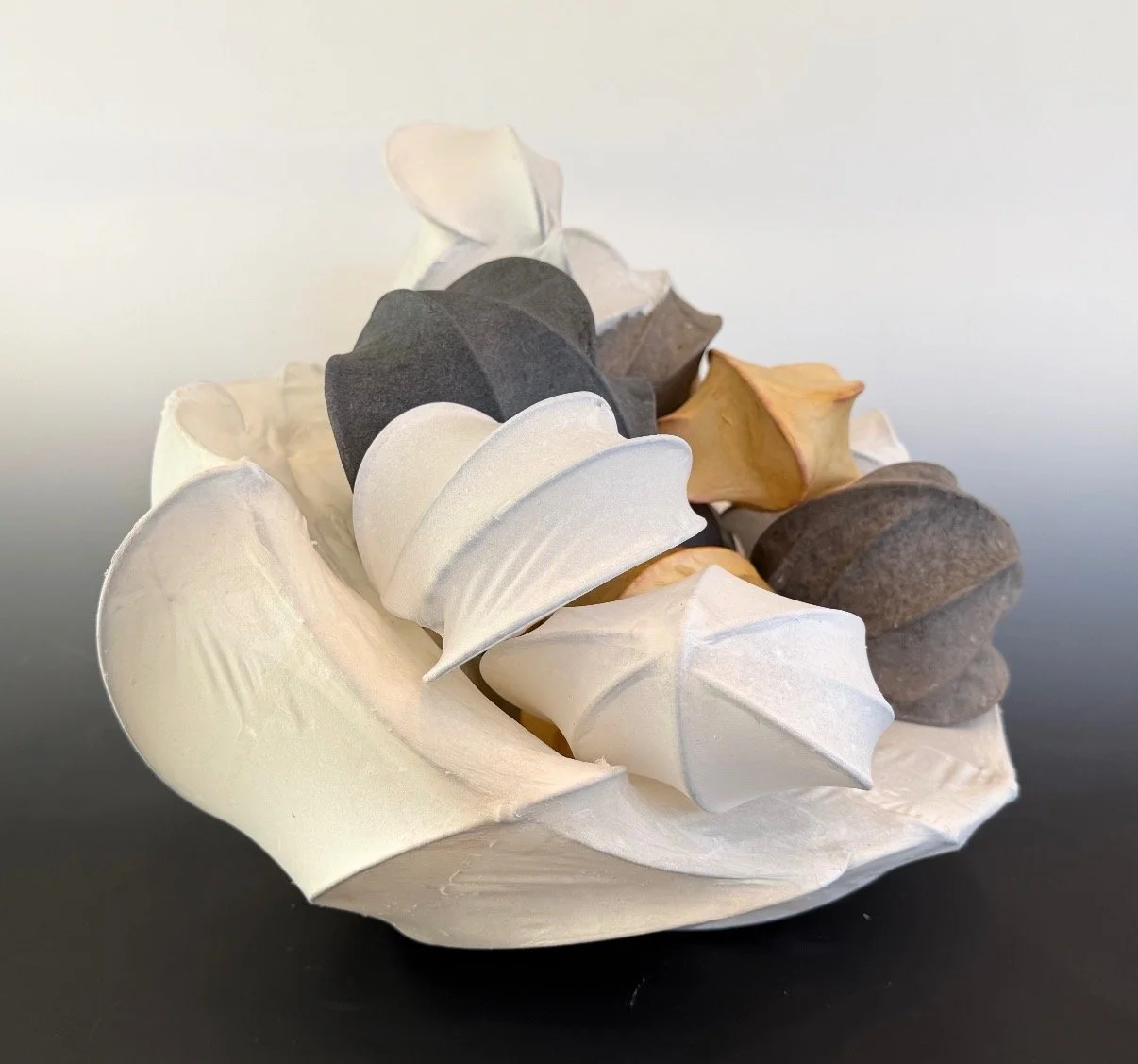 Wire forms wrapped in handmade abaca paper