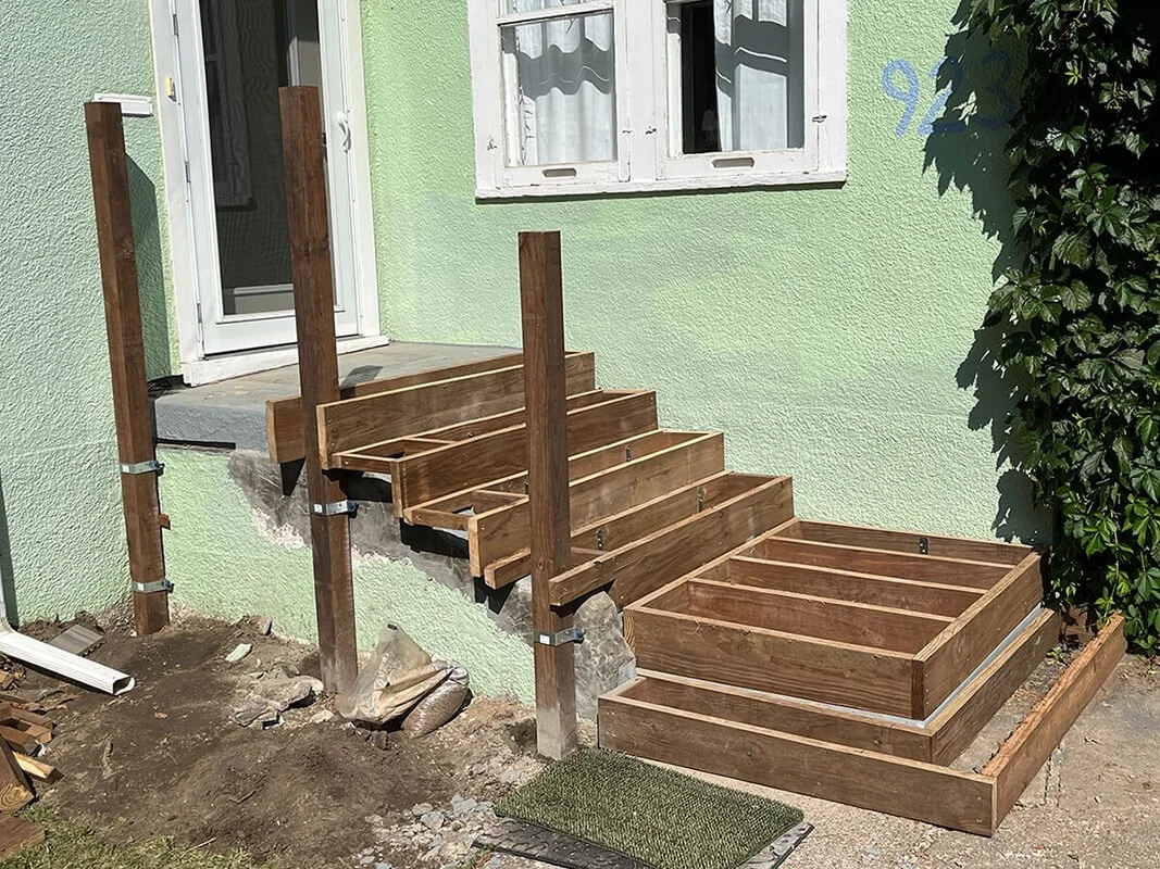 Deck framing with railing and support posts
