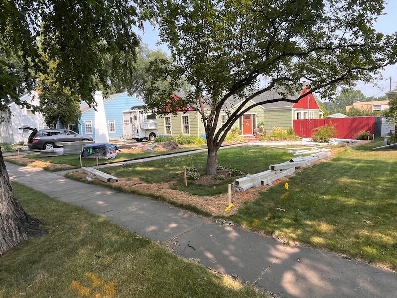 Staking out vinyl fence installation in Bismarck