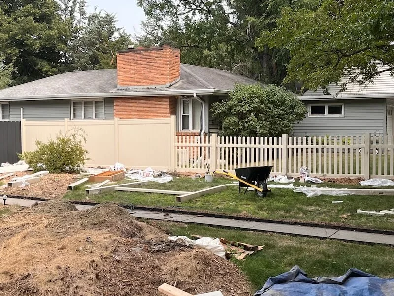 Vinyl fence with picket and privacy sections