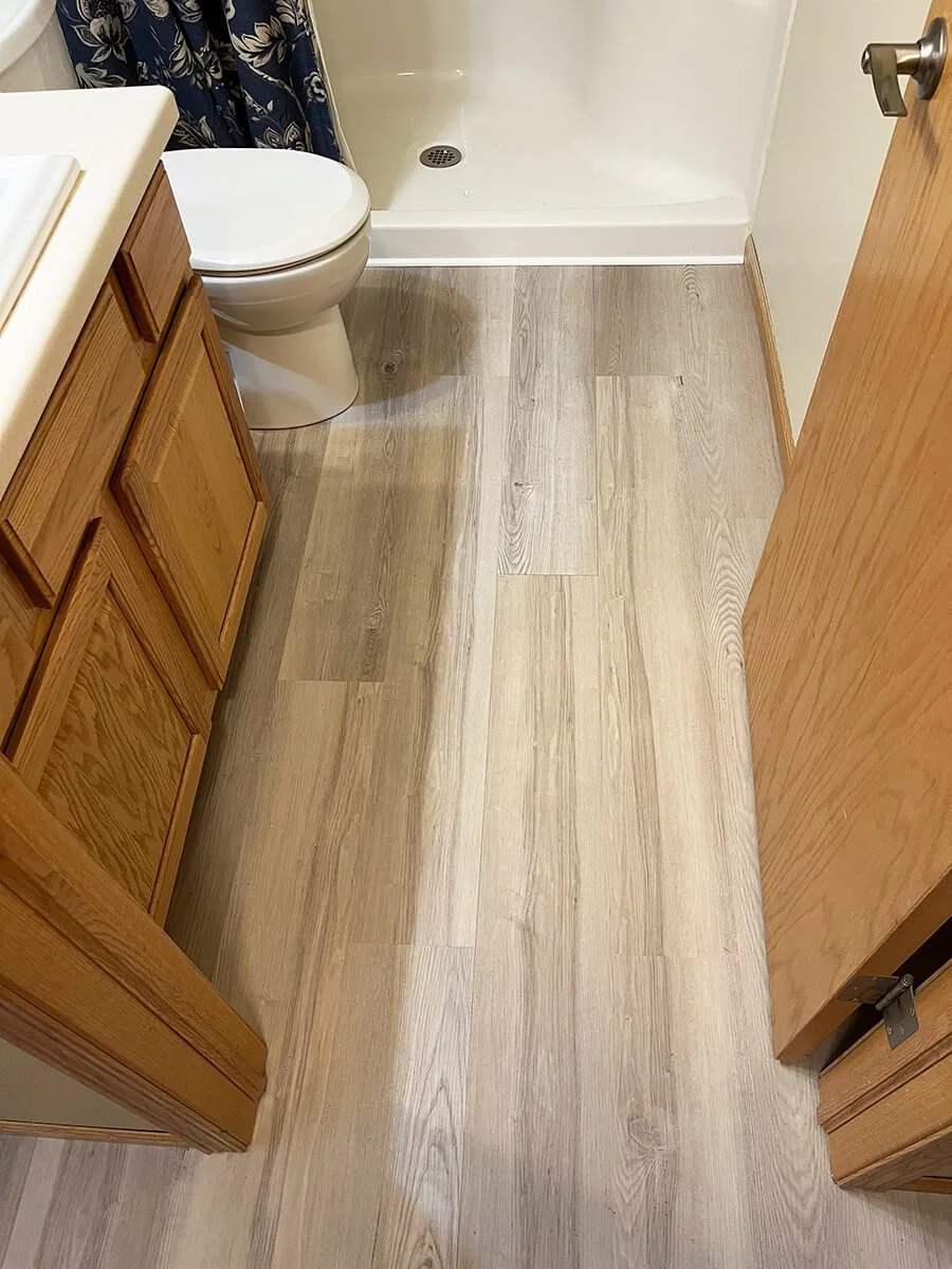 Bismarck vinyl plank flooring installation in bathroom
