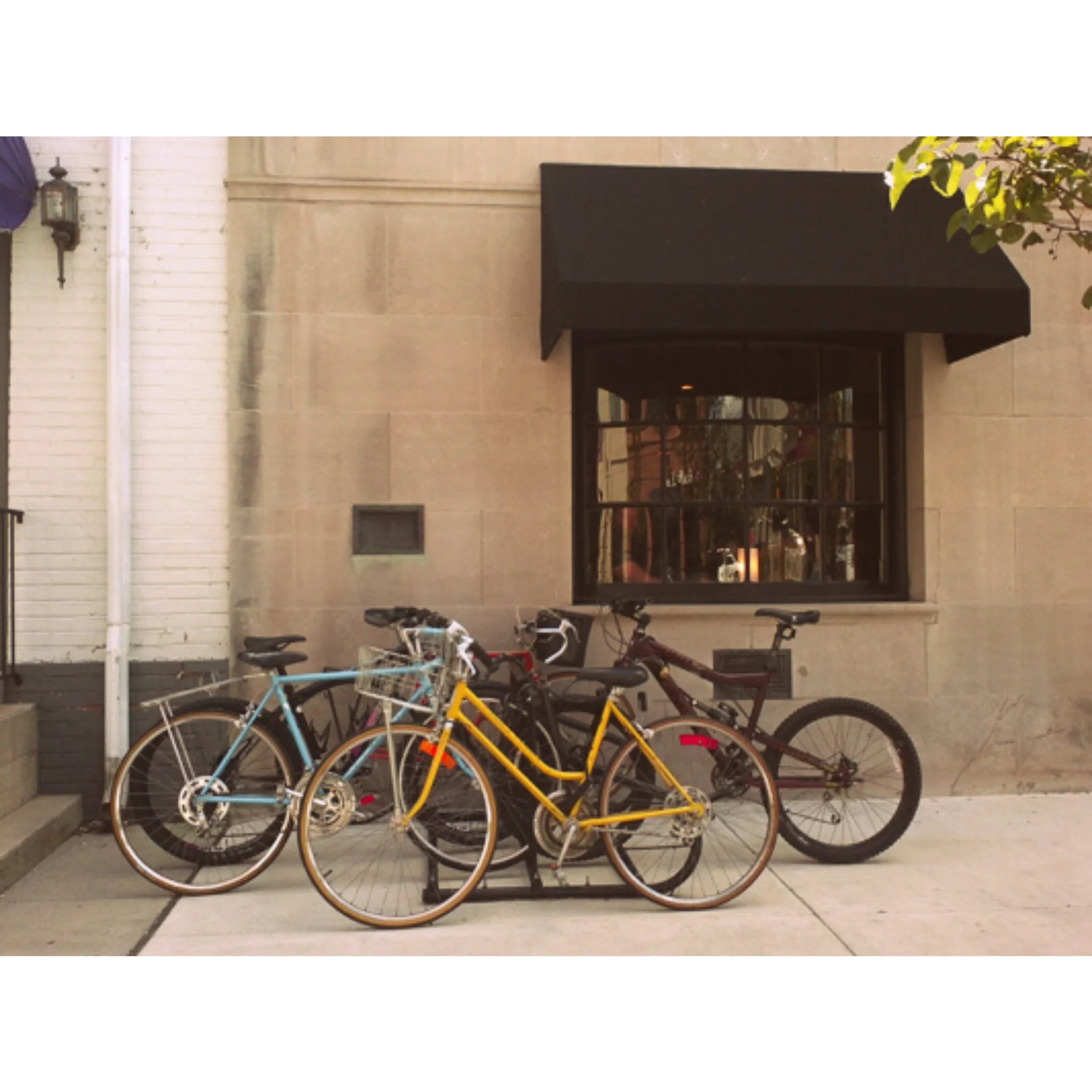 Bicycles Parked at Bike Rack | Urban Transportation Stock Photo – 0035615