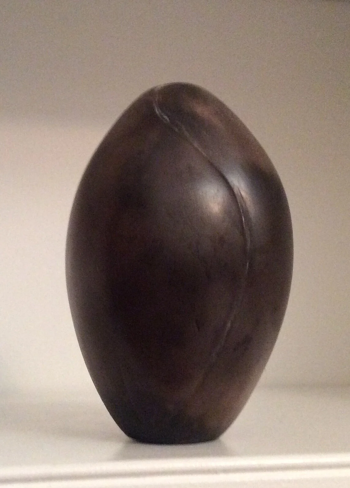 Small vessel, carved. Smoke fired.