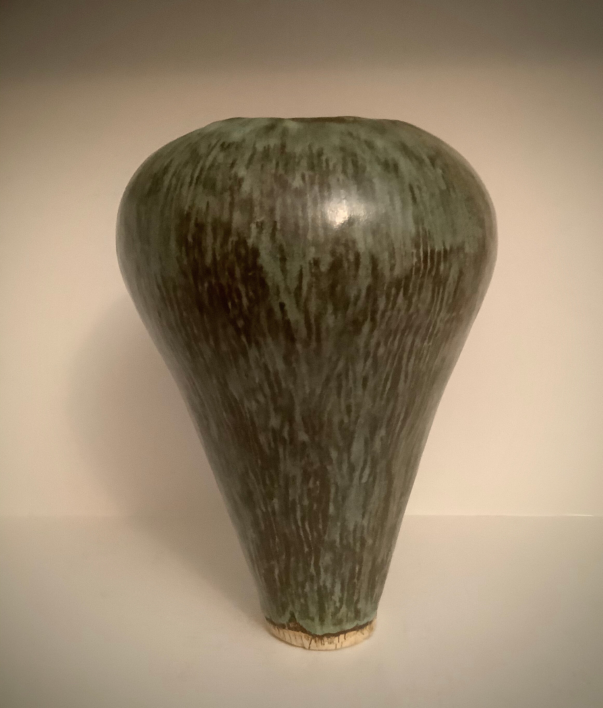 Green vessel. Glaze surface.